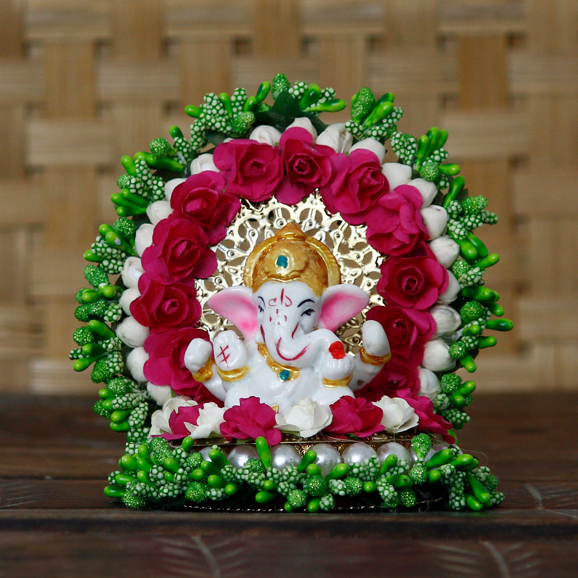 Divine Lord Ganesha Idol on Floral Plate